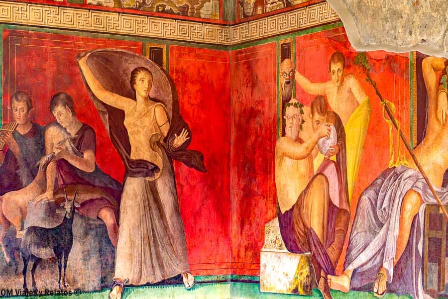 Frescos de la Villa de los Misterios en Pompeya, una joya arqueológica imprescindible al planificar como ir de Roma a Pompeya.